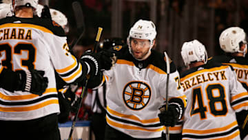 SUNRISE, FL - DECEMBER 14: Jake DeBrusk #74 of the Boston Bruins celebrates his goal with teammates during the first period against the Florida Panthers at the BB&T Center on December 14, 2019 in Sunrise, Florida. (Photo by Eliot J. Schechter/NHLI via Getty Images)