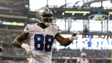 Aug 16, 2014; Arlington, TX, USA; Dallas Cowboys receiver Dez Bryant (88) celebrates a touchdown in the first quarter against the Baltimore Ravens at AT&T Stadium. Mandatory Credit: Matthew Emmons-USA TODAY Sports
