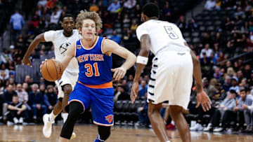 Dec 17, 2016; Denver, CO, USA; Denver Nuggets guard Will Barton (5) guards New York Knicks guard Ron Baker (31) in the fourth quarter at the Pepsi Center. The Nuggets won 127-114. Mandatory Credit: Isaiah J. Downing-USA TODAY Sports