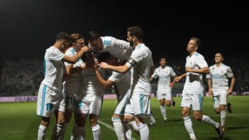 MADRID, SPAIN - OCTOBER 26: Marco Asensio of Real Madrid CF celebrates with teammates after scoring his teamÕs opening goal from a penalty kick during the Copa del Rey, Round of 32, First Leg match between Fuenlabrada and Real Madrid at Estadio Fernando Torres on October 26, 2017 in Madrid, Spain. (Photo by Denis Doyle/Getty Images)