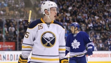 Mar 7, 2016; Toronto, Ontario, CAN; Buffalo Sabres center Jack Eichel (15) celebrates his goal in the third period against the Toronto Maple Leafs at Air Canada Centre. The Sabres beat the Maple Leafs 4-3 in a shootout. Mandatory Credit: Tom Szczerbowski-USA TODAY Sports