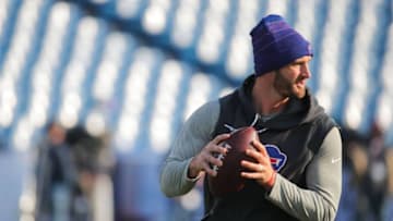 ORCHARD PARK, NY - DECEMBER 03: Nathan Peterman #2 of the Buffalo Bills holds the ball while warming up before a game against the New England Patriots on December 3, 2017 at New Era Field in Orchard Park, New York. (Photo by Brett Carlsen/Getty Images)