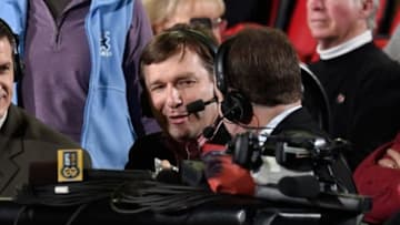 Jan 23, 2016; Athens, GA, USA; Georgia Bulldogs new head football coach Kirby Smart (center) is interviewed for television at the basketball game against the Arkansas Razorbacks at Stegeman Coliseum. Georgia defeated Arkansas 76-73 in overtime. Mandatory Credit: Dale Zanine-USA TODAY Sports