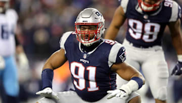 FOXBOROUGH, MA - JANUARY 13: Deatrich Wise, Jr. #91 of the New England Patriots reacts during the fourth quarter in the AFC Divisional Playoff game against the Tennessee Titans at Gillette Stadium on January 13, 2018 in Foxborough, Massachusetts. (Photo by Elsa/Getty Images)
