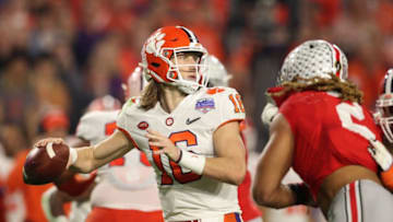 GLENDALE, ARIZONA - DECEMBER 28: Quarterback Trevor Lawrence #16 of the Clemson Tigers drops back to pass during the PlayStation Fiesta Bowl against the Ohio State Buckeyes at State Farm Stadium on December 28, 2019 in Glendale, Arizona. The Tigers defeated the Buckeyes 29-23. (Photo by Christian Petersen/Getty Images)
