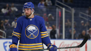 BUFFALO, NEW YORK - SEPTEMBER 27: Lukas Rousek #13 of the Buffalo Sabres looks on during the first period against the Philadelphia Flyers at KeyBank Center on September 27, 2022 in Buffalo, New York. (Photo by Joshua Bessex/Getty Images)