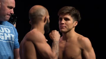 LAS VEGAS, NEVADA - APRIL 22: (L-R) UFC flyweight champion Demetrious Johnson and Henry Cejudo face off during the UFC 197: Weigh-ins at MGM Grand Hotel & Casino on April 22, 2016 in Las Vegas Nevada. (Photo by Brandon Magnus/Zuffa LLC/Zuffa LLC via Getty Images)
