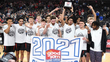 Nov 23, 2021; Las Vegas, Nevada, USA; Gonzaga Bulldogs players celebrate with the Good Sam Empire Classic championship trophy after defeating the UCLA Bruins 83-63 at T-Mobile Arena. Mandatory Credit: Stephen R. Sylvanie-USA TODAY Sports