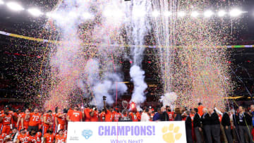 ARLINGTON, TEXAS - DECEMBER 29: The Clemson Tigers celebrate with the trophy after defeating the Notre Dame Fighting Irish during the College Football Playoff Semifinal Goodyear Cotton Bowl Classic at AT&T Stadium on December 29, 2018 in Arlington, Texas. Clemson defeated Notre Dame 30-3. (Photo by Tom Pennington/Getty Images)