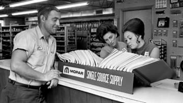 Joe Driscoll, left, of the Chickasaw Motor Lines, gets help from Mrs. Gypsy Cheek and Mrs. Carol Waffird for some parts June 25, 1979 at the Madam Mopar, Inc., an all-girl operated automobile part company at 1130 Polk Ave.69then06 090
