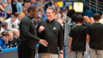 Kansas coach Bill Self meets North Carolina Central coach LeVelle Moton before the start of Monday's game inside Allen Fieldhouse.