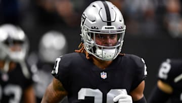 LAS VEGAS, NEVADA - AUGUST 14: Cornerback Damon Arnette #20 of the Las Vegas Raiders warms up before a preseason game against the Seattle Seahawks at Allegiant Stadium on August 14, 2021 in Las Vegas, Nevada. The Raiders defeated the Seahawks 20-7. (Photo by Chris Unger/Getty Images)