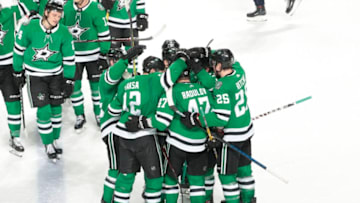 DALLAS, TX - JANUARY 4: Alexander Radulov #47, Radek Faksa #12, Brett Ritchie #25 and the Dallas Stars celebrate a win against the Washington Capitals at the American Airlines Center on January 4, 2019 in Dallas, Texas. (Photo by Glenn James/NHLI via Getty Images)