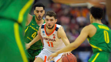 LOUISVILLE, KY - MARCH 28: Virginia Cavaliers guard Ty Jerome (11) drives up the court during a full court press during a game between the Virginia Cavaliers and the Oregon Ducks in the south regional semi-final of the NCAA men's basketball tournament in Louisville, KY on March 28, 2019 . (Photo by John McDonnell/The Washington Post via Getty Images)