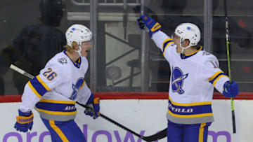 Apr 6, 2021; Newark, New Jersey, USA; Buffalo Sabres defenseman Rasmus Dahlin (26) and Buffalo Sabres defenseman Henri Jokiharju (10) celebrate DahlinÕs goal during the second period of their game against the New Jersey Devils at Prudential Center. Mandatory Credit: Ed Mulholland-USA TODAY Sports
