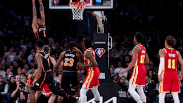 NEW YORK, NEW YORK - MARCH 22: Obi Toppin #1 of the New York Knicks dunks against Bogdan Bogdanovi #13 of the Atlanta Hawks at Madison Square Garden on March 22, 2022 in New York City. NOTE TO USER: User expressly acknowledges and agrees that, by downloading and or using this photograph, User is consenting to the terms and conditions of the Getty Images License Agreement. (Photo by Michelle Farsi/Getty Images)