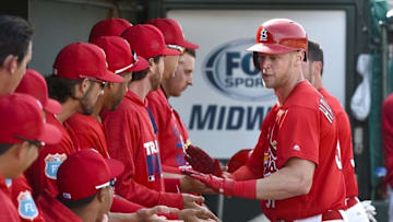 Mar 21, 2016; Jupiter, FL, USA; St. Louis Cardinals left fielder Jeremy Hazelbaker (91) is congratulated after hitting a two run home run against the Boston Red Sox during the game at Roger Dean Stadium. The Red Sox defeated the Cardinals 4-3. Mandatory Credit: Scott Rovak-USA TODAY Sports