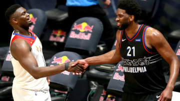 Zion Williamson #1 of the New Orleans Pelicans and Joel Embiid #21 of the Philadelphia 76ers (Photo by Sean Gardner/Getty Images)