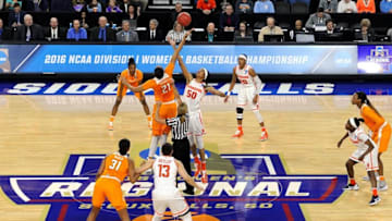 Mar 27, 2016; Sioux Falls, SD, USA; Tennessee Lady Volunteers center Mercedes Russell (21) and Syracuse Orange center Briana Day (50) tip off to start action in the first half in the finals of the Sioux Falls regional of the women