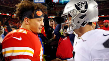 Quarterback Patrick Mahomes #15 of the Kansas City Chiefs greets quarterback Derek Carr #4 of the Oakland Raiders (Photo by Jamie Squire/Getty Images)