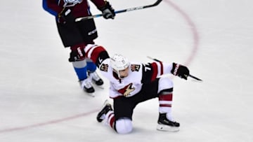 Nov 8, 2016; Denver, CO, USA; Arizona Coyotes defenseman Anthony DeAngelo (77) celebrates his goal in the second period against the Colorado Avalanche at Pepsi Center. Mandatory Credit: Ron Chenoy-USA TODAY Sports