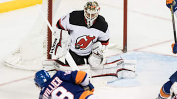 BROOKLYN, NY - NOVEMBER 03: New Jersey Devils Goalie Keith Kinkaid (1) stops a shot by New York Islanders Winger Anthony Beauvillier (18) during the second period of a regular season NHL game between the New Jersey Devils and the New York Islanders on November 03, 2018, at Barclays Center in Brooklyn, NY. (Photo by David Hahn/Icon Sportswire via Getty Images)