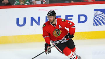 Feb 13, 2016; Chicago, IL, USA; Chicago Blackhawks defenseman Brent Seabrook (7) with the puck during the third period against the Anaheim Ducks at the United Center. Anaheim won 3-2 in overtime. Mandatory Credit: Dennis Wierzbicki-USA TODAY Sports
