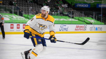 Jan 24, 2021; Dallas, Texas, USA; Nashville Predators defenseman Mattias Ekholm (14) in action during the game between the Dallas Stars and the Nashville Predators at the American Airlines Center. Mandatory Credit: Jerome Miron-USA TODAY Sports