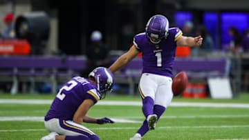 MINNEAPOLIS, MN - AUGUST 21: Greg Joseph #1 kicks the ball while Britton Colquitt #2 of the Minnesota Vikings holds before the start of a preseason game against the Indianapolis Colts at U.S. Bank Stadium on August 21, 2021 in Minneapolis, Minnesota. The Colts defeated the Vikings 12-10. (Photo by David Berding/Getty Images)