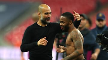 LONDON, ENGLAND - APRIL 14: Josep Guardiola, Manager of Manchester City celebrates victory with Raheem Sterling of Manchester City after the Premier League match between Tottenham Hotspur and Manchester City at Wembley Stadium on April 14, 2018 in London, England. (Photo by Catherine Ivill/Getty Images)