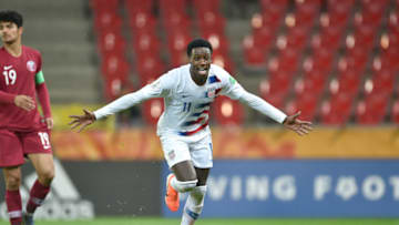 TYCHY, POLAND - MAY 30: Tim Weah of the United States celebrates after scoring their team's first goal during the 2019 FIFA U-20 World Cup group D match between USA and Qatar at Tychy Stadium on May 30, 2019 in Tychy, Poland. (Photo by Aitor Alcalde - FIFA/FIFA via Getty Images)