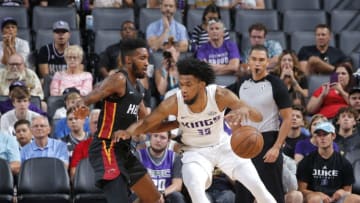 SACRAMENTO, CA - JULY 5: Marvin Bagley III #35 of the Sacramento Kings handles the ball against the Miami Heat during the 2018 Summer League at the Golden 1 Center on July 5, 2018 in Sacramento, California. NOTE TO USER: User expressly acknowledges and agrees that, by downloading and or using this photograph, User is consenting to the terms and conditions of the Getty Images License Agreement. Mandatory Copyright Notice: Copyright 2018 NBAE (Photo by Rocky Widner/NBAE via Getty Images)
