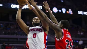 Oct 7, 2014; Auburn Hills, MI, USA; Detroit Pistons center Andre Drummond (0) shoots on Chicago Bulls forward Solomon Jones (25) in the fourth quarter at The Palace of Auburn Hills. Detroit won 111-109 in overtime. Mandatory Credit: Rick Osentoski-USA TODAY Sports