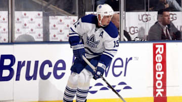 Tomas Kaberle #15 of the Toronto Maple Leafs carries the puck during game action against the Washington Capitals. (Photo by Abelimages/Getty Images)