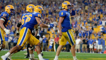 PITTSBURGH, PA - SEPTEMBER 21: Kenny Pickett #8 of the Pittsburgh Panthers reacts after a 3-yard touchdown reception in the fourth quarter during the game against the UCF Knights at Heinz Field on September 21, 2019 in Pittsburgh, Pennsylvania. (Photo by Justin Berl/Getty Images)