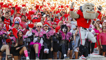 ATHENS, GA - OCTOBER 16: Hairy Dawg leads Georgia Bulldogs fans in a cheer in the second half against the Kentucky Wildcats at Sanford Stadium on October 16, 2021 in Athens, Georgia. (Photo by Todd Kirkland/Getty Images)