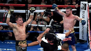 LAS VEGAS, NV - SEPTEMBER 16: (L-R) Gennady Golovkin and Canelo Alvarez both celebrate after the final round in their WBC, WBA and IBF middleweight championionship bout at T-Mobile Arena on September 16, 2017 in Las Vegas, Nevada. (Photo by Ethan Miller/Getty Images)