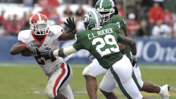ORLANDO, FL - JANUARY 1: Running back Knowshon Moreno #24 of the University of Georgia rushes upfield against the Michigan State Spartans at the 2009 Capital One Bowl at the Citrus Bowl on January 1, 2009 in Orlando, Florida. (Photo by Al Messerschmidt/Getty Images)
