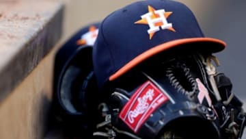 Aug 2, 2013; Minneapolis, MN, USA; A general view of a Houston Astros hat and glove in the dugout during a game against the Minnesota Twins at Target Field. Mandatory Credit: Jesse Johnson-USA TODAY Sports