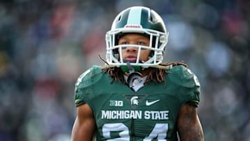 Nov 28, 2015; East Lansing, MI, USA; Michigan State Spartans running back Gerald Holmes (24) walks off the field during the 1st quarter of a game against the Penn State Nittany Lions at Spartan Stadium. Mandatory Credit: Mike Carter-USA TODAY Sports