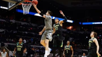 Mar 23, 2014; San Antonio, TX, USA; Creighton Bluejays forward Doug McDermott (3) drives to the basket around Baylor Bears center Isaiah Austin (21) during the game in the third round of the 2014 NCAA Tournament at AT&T Center. Mandatory Credit: Kevin Jairaj-USA TODAY Sports
