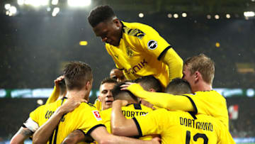 DORTMUND, GERMANY - DECEMBER 17: Jadon Sancho of Borussia Dortmund celebrates with teammates after scoring his team's third goal during the Bundesliga match between Borussia Dortmund and RB Leipzig at Signal Iduna Park on December 17, 2019 in Dortmund, Germany. (Photo by Lars Baron/Bongarts/Getty Images)