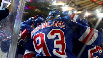 NEW YORK, NEW YORK - APRIL 19: Ryan Strome #16 of the New York Rangers celebrates his goal with teammate Mika Zibanejad #93 after he scored during the second period against the Winnipeg Jets at Madison Square Garden on April 19, 2022 in New York City. (Photo by Elsa/Getty Images)