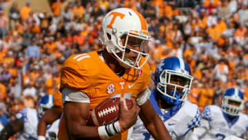 Nov 12, 2016; Knoxville, TN, USA; Tennessee Volunteers quarterback Joshua Dobbs (11) runs the ball against the Kentucky Wildcatsduring the first half at Neyland Stadium. Mandatory Credit: Randy Sartin-USA TODAY Sports