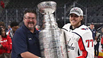 LAS VEGAS, NV - JUNE 07: T.J. Oshie #77 of the Washington Capitals and his father, Tim, hold the Stanley Cup after the Capitals defeated the Vegas Golden Knights 4-3 in Game Five of the 2018 NHL Stanley Cup Final at T-Mobile Arena on June 7, 2018 in Las Vegas, Nevada. The Capitals won the series four games to one. (Photo by Dave Sandford/NHLI via Getty Images)