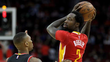 Nov 17, 2016; Houston, TX, USA; Houston Rockets guard Patrick Beverley (2) looks to pass inside while Portland Trail Blazers guard Damian Lillard (0) defends during the first quarter at Toyota Center. Mandatory Credit: Erik Williams-USA TODAY Sports