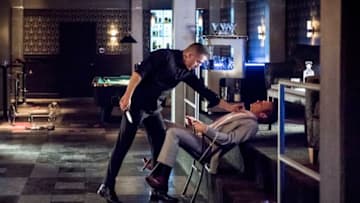 Arrow -- "The Dragon" -- Image Number: AR619a_0260.jpg -- Pictured (L-R): Kirk Acevedo as Ricardo Diaz and Ashton Holmes as Eric Cartier -- Photo: Dean Buscher/The CW -- ÃÂ© 2018 The CW Network, LLC. All rights reserved.