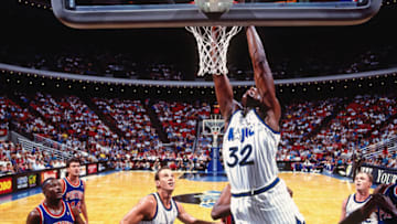 ORLANDO, FL - 1994: Shaquille O'Neal #32 of the Orlando Magic goes up for a dunk during a game against the Detroit Pistons circa 1994 at Orlando Arena in Orlando, Florida. NOTE TO USER: User expressly acknowledges and agrees that, by downloading and or using this photograph, User is consenting to the terms and conditions of the Getty Images License Agreement. Mandatory Copyright Notice: Copyright 1994 NBAE (Photo by Nathaniel S. Butler/NBAE via Getty Images)