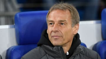 Hertha Berlin's German head coach Jurgen Klinsmann sits on the bench during the German Cup (DFB Pokal) round of 16 football match Schalke 04 v Hertha Berlin in Gelsenkirchen, westen Germany on February 4, 2020. (Photo by INA FASSBENDER / AFP) / DFB REGULATIONS PROHIBIT ANY USE OF PHOTOGRAPHS AS IMAGE SEQUENCES AND QUASI-VIDEO. (Photo by INA FASSBENDER/AFP via Getty Images)