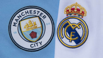 MANCHESTER, ENGLAND - JULY 19: The Manchester City and Real Madrid club crests on the first team home shirts on July 19, 2020 in Manchester, United Kingdom. (Photo by Visionhaus)